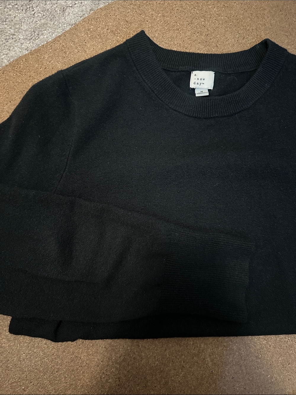 Black a new day sweater